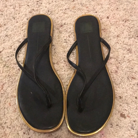 black sandals with gold trim